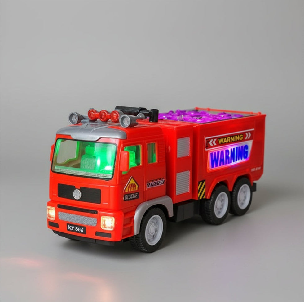 camion pompier jouet lumineux rouge dans le salon