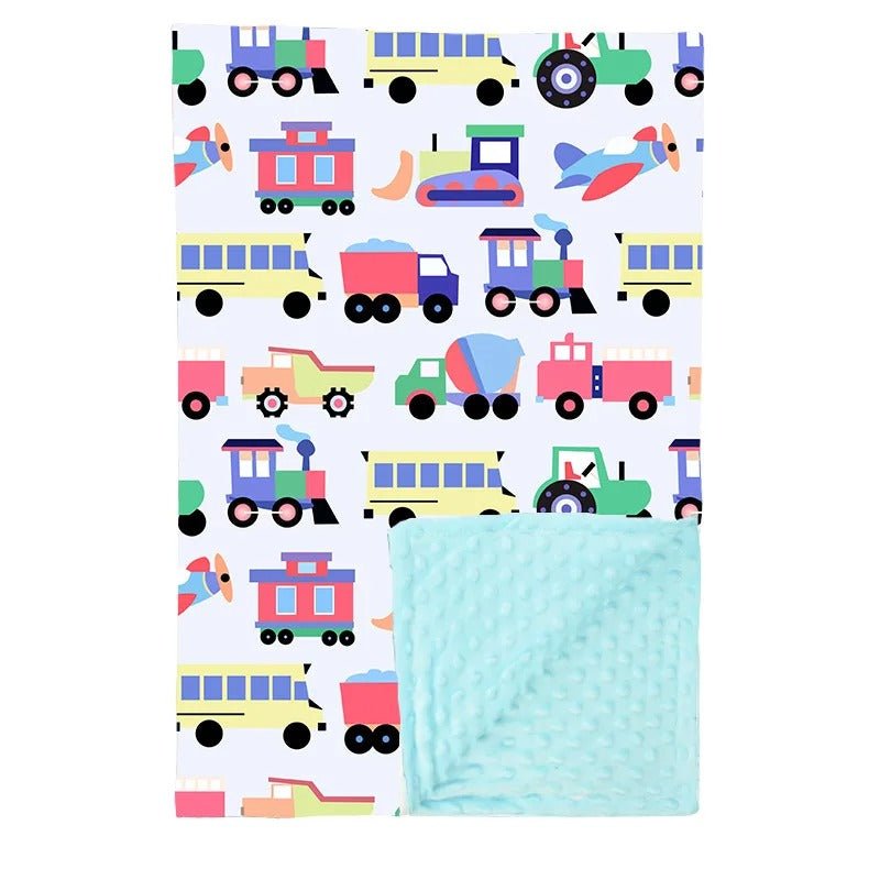 couverture bebe et plusieurs vehicule d'ingenierie