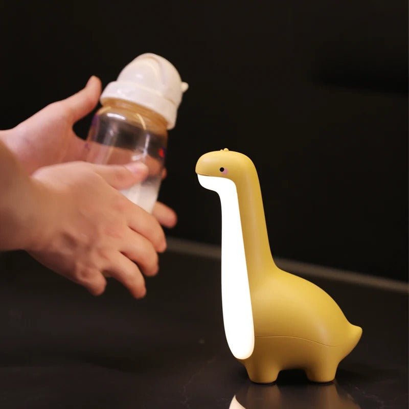 veilleuse bebe dinodouceur avec biberon