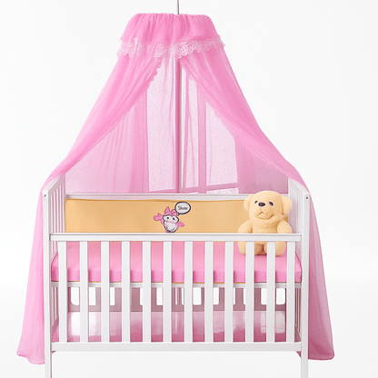 ciel de lit bebe rose sur un lit