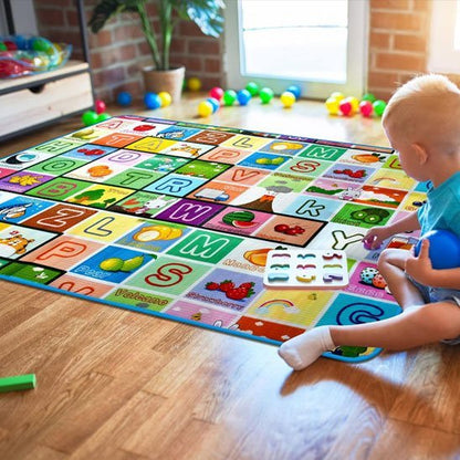 grand tapis d’éveil et petit garçon
