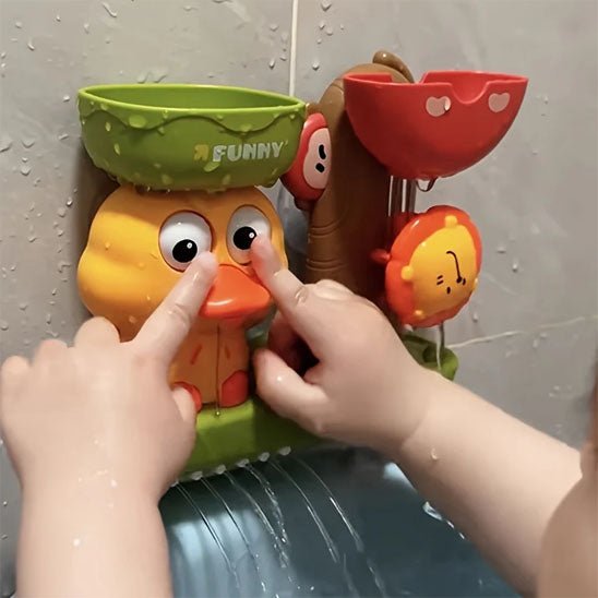 jouet baignoire bebe canardoo qui louche avec bebe