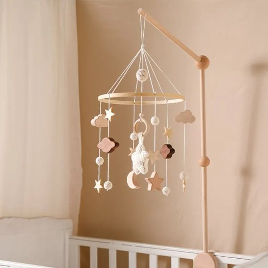 mobile bebe accrocher au lit