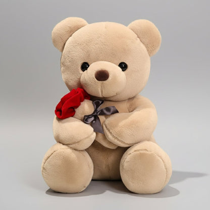ours en peluche nounours beige tien une rose