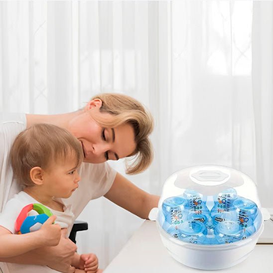 sterilisateur biberon et maman avec bebe