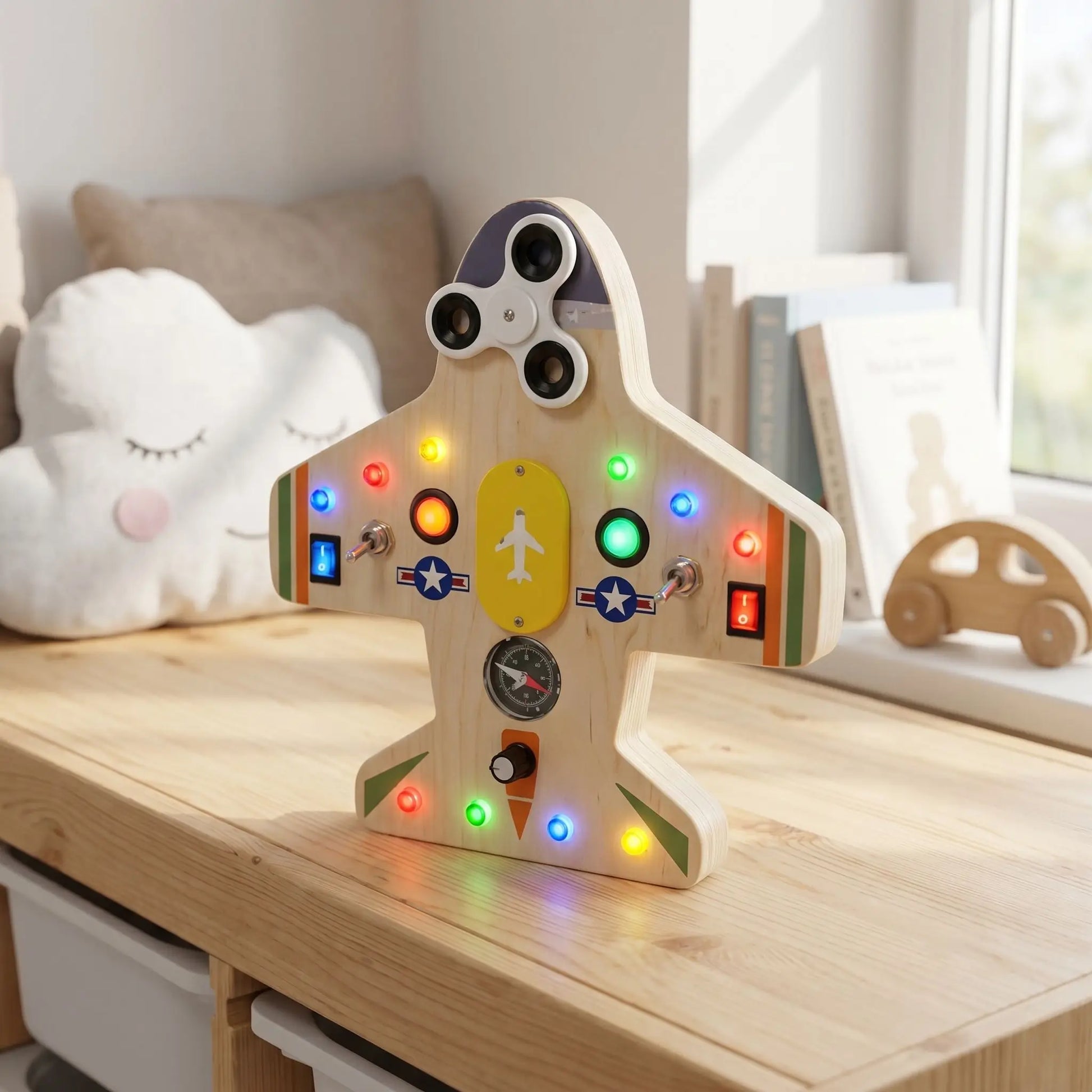tableau d’activité bébé lumineux avion