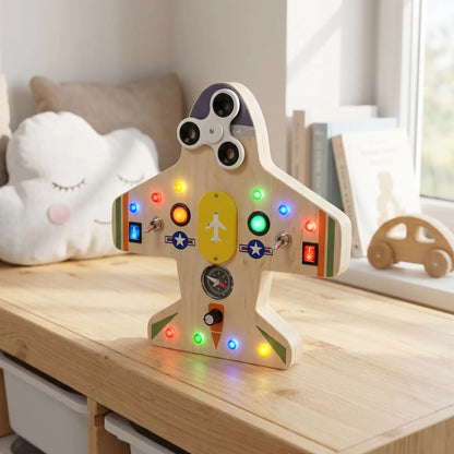 tableau d’activité bébé lumineux avion