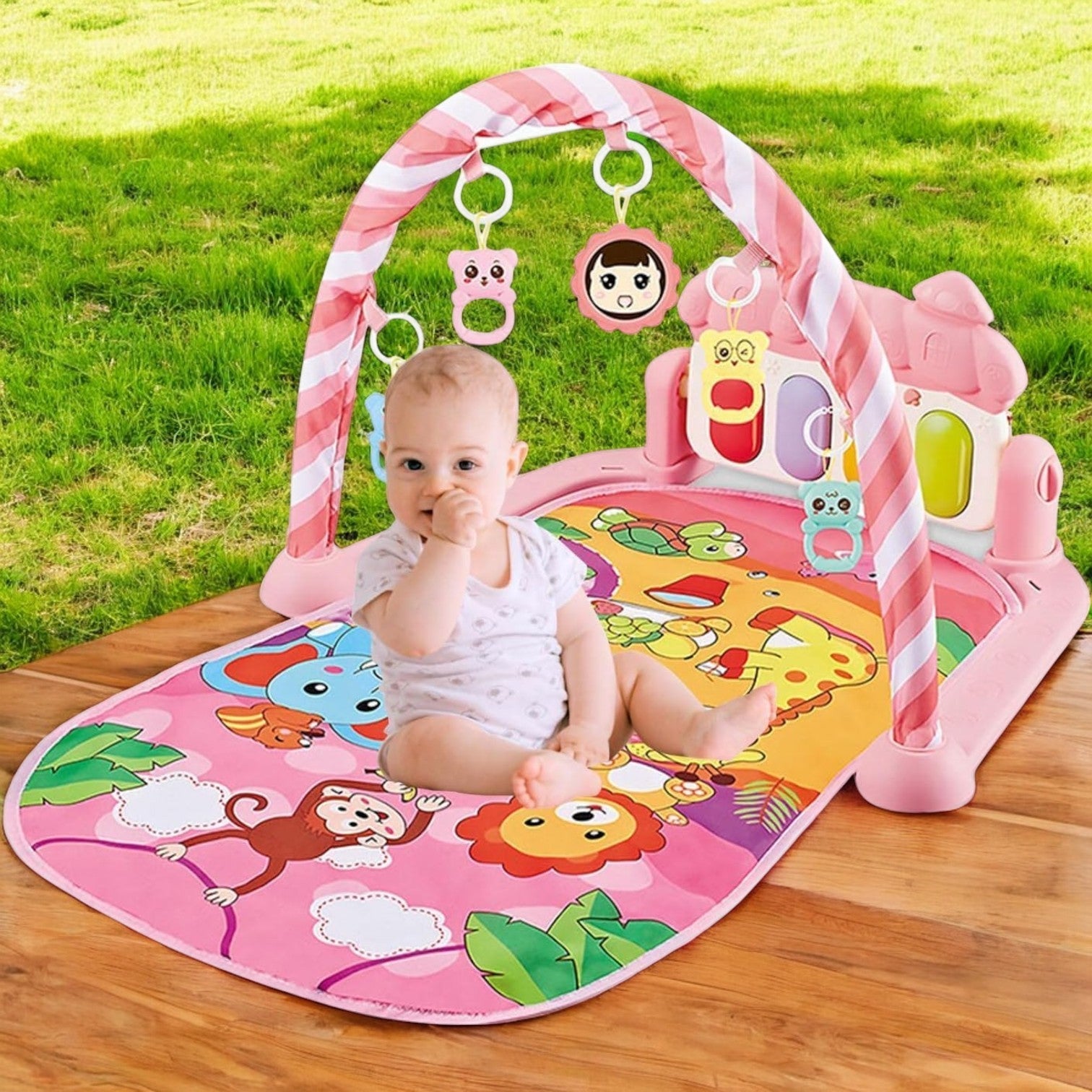 tapis d’éveil éducatif bébé dans le jardin
