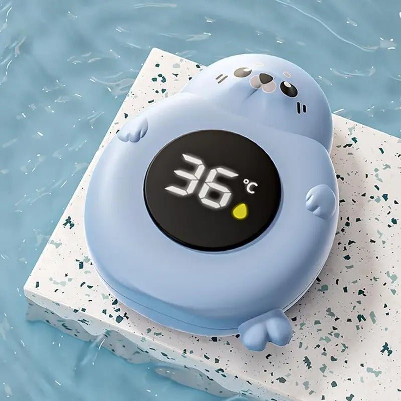 thermometre bain bebe bleu sur boite