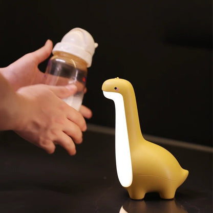 veilleuse bebe dinodouceur avec biberon